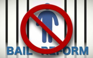 This is an image of a cartoon drawn person in jail that symbolizes bail reform and improving the jail system.